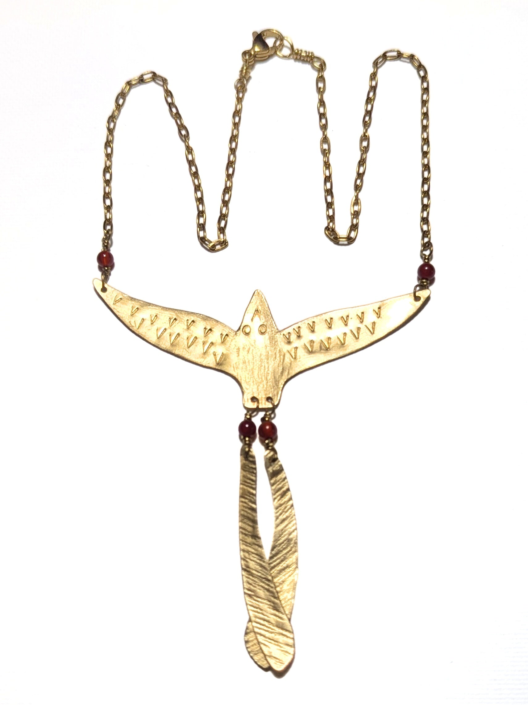 Gold necklace with a unique phoenix bird pendant